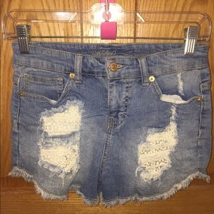 Short shorts ripped with lace. Perfect condition.